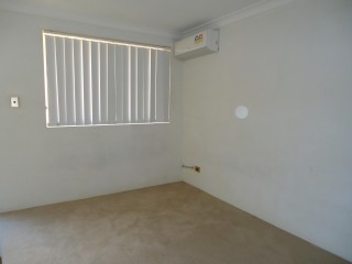 View profile: Tiled Living Area, Air Conditioning & Large Balcony