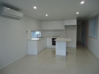 View profile: Air Conditioning & Tiled Throughout