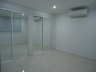View profile: Air Conditioning & Tiled Throughout
