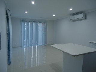 View profile: Air Conditioning & Tiled Throughout