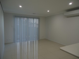 View profile: Air Conditioning & Tiled Throughout