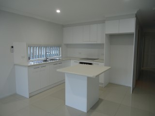 View profile: Air Conditioning & Tiled Throughout
